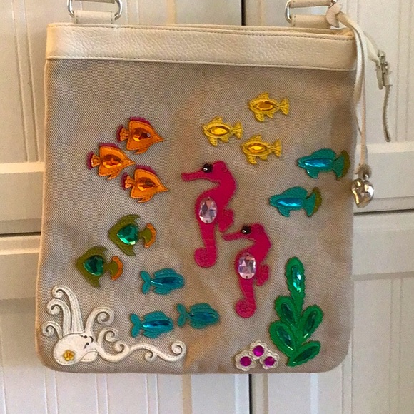 Brighton, retired, canvas & leather, beaded fish messenger...